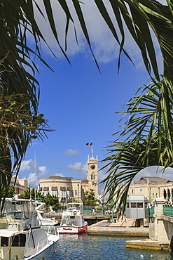 Parliament building with Barbados flag and bridge through trees, Bridgetown, Barbados, West Indies, Caribbean, Central America