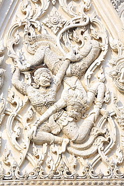 Detail of battling demons on Khmer style Wat Mahathat Worawihan temple in Phetchaburi, Thailand, Southeast Asia, Asia