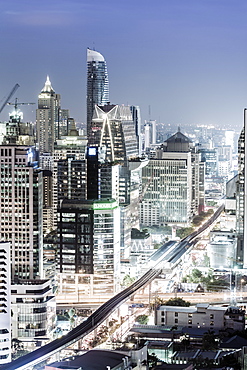 Bangkok skyline showing the Skytrain and Chit Lom, Sukhumvit and Ploen Chit areas, Bangkok, Thailand, Southeast Asia, Asia