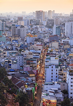 View of Bui Vien street and the skyline of downtown Ho Chi Minh City (Saigon), Vietnam, Indochina, Southeast Asia, Asia