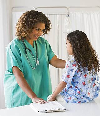 African girl talking to doctor