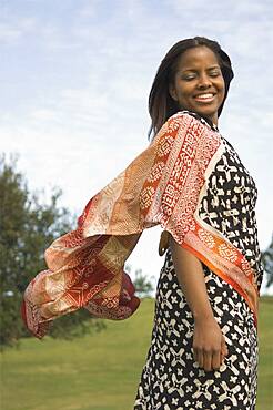 African woman wearing dress outdoors