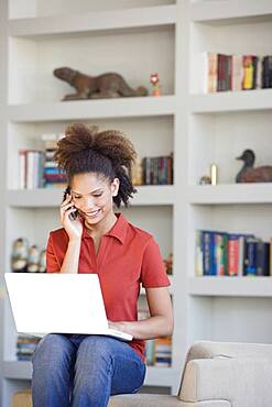 African woman talking on cell phone