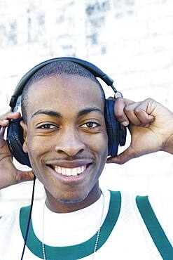 Teenage boy wearing headphones