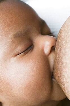 Close up of African baby nursing