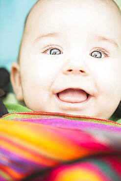 Mixed race baby smiling