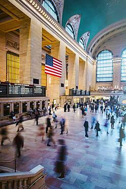 Blurred view of people in train station, New York, New York, United States