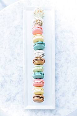 Overhead view of variety of macaroon cookies