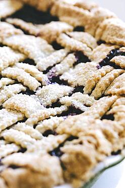 Close up of blueberry pie with lattice crust