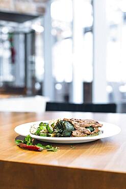 Plate of grilled pepper with vegetables and rice