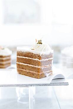 Close up of platter of cake on cafe counter