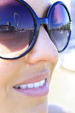 London Eye reflecting in sunglasses, Middlesex, United Kingdom