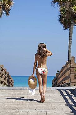 Caucasian woman wearing bikini outdoors