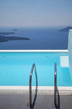 Swimming pool on hilltop over ocean