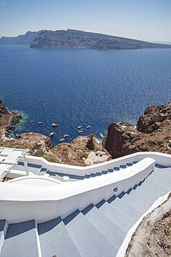 High angle view of hillside steps over ocean