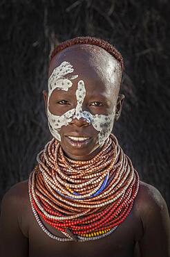 Black woman wearing traditional jewelry