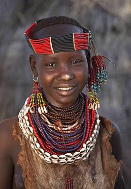 Black girl wearing traditional jewelry