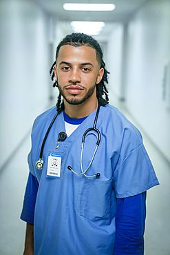 Portrait of serious mixed race nurse