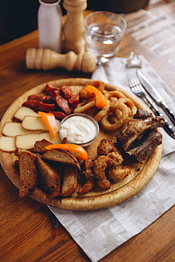 Appetizers with sauce on table