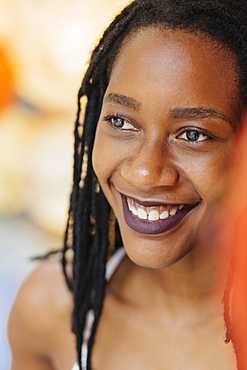 Portrait of smiling Mixed Race woman