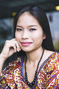 Portrait of smiling Asian woman