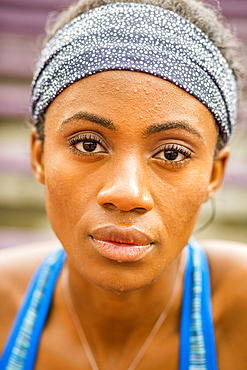 Serious Black woman sweating