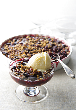 Vanilla ice cream and cherry crisp