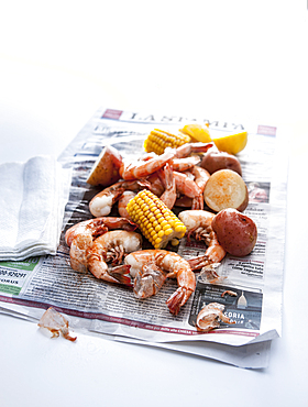 Seafood boil on newspaper