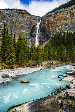 Waterfall flowing over cliff