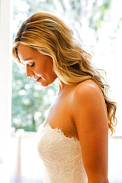 Caucasian bride looking down