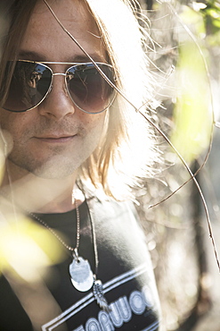 Caucasian man wearing sunglasses outdoors