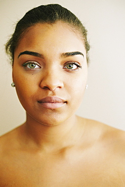 Portrait of serious Mixed Race woman