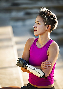 Portrait of athlete woman with prosthetic arm