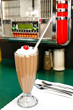 Chocolate milkshake on diner table