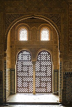 Spain, Granada, Lattice windows and ornate walls in The Alhambra