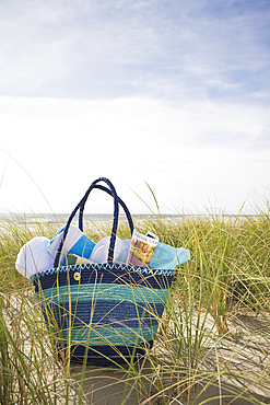 Beach bag with towels on beach, Nuntucket Island