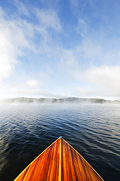 Boat on Lake Placid in morning mist