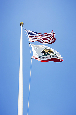 US and California flags, Sausalito, California, USA