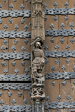 Wooden door with knight figurine at Brussels Town Hall, Brussels, Belgium