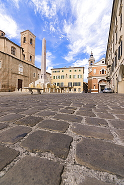 Historical buildings and obelisk of the ancient Piazza Federico II, Jesi, Province of Ancona, Marche, Italy, Europe