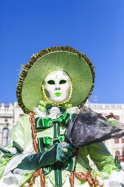 Colourful mask and costume of the Carnival of Venice, famous festival worldwide, Venice, Veneto, Italy, Europe