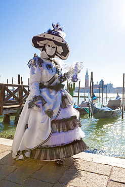 Colourful mask and costume of the Carnival of Venice, famous festival worldwide, Venice, Veneto, Italy, Europe