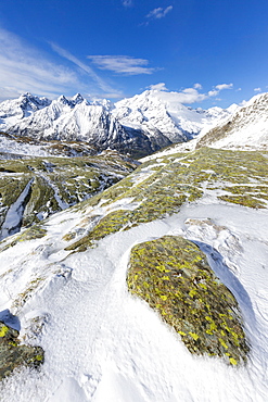 Sunshine and snow at Alpe Fora with Monte Disgrazia in the background, Malenco Valley, Province of Sondrio, Valtellina, Lombardy, Italy, Europe