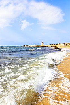 Sea waves crashing on sand beach of Baia dei Mulini, Trapani, Sicily, Italy, Mediterranean, Europe