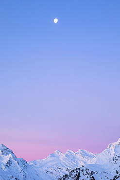 Sunrise on the snowy peaks of Val Maroz, Bregaglia Valley, Engadine, Canton of Graubunden, Switzerland, Europe