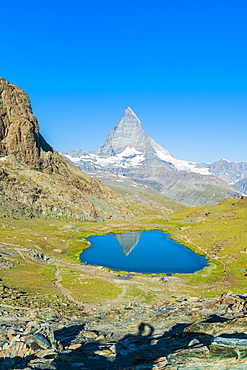 Lake Riffelsee with the Matterhorn in the background, Zermatt, canton of Valais, Swiss Alps, Switzerland, Europe