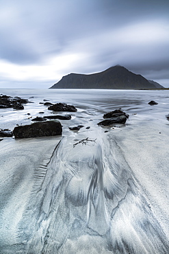 Storm clouds on the rough sea, Skagsanden beach, Flakstad, Nordland county, Lofoten Islands, Norway, Europe