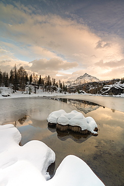 Snow on Lake Mufule by Sasso Moro in Sondrio, Italy, Europe