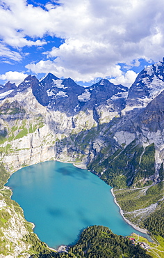 Aerial panoramic of alpine Oeschinensee lake, Bernese Oberland, Kandersteg, Canton of Bern Switzerland, Europe