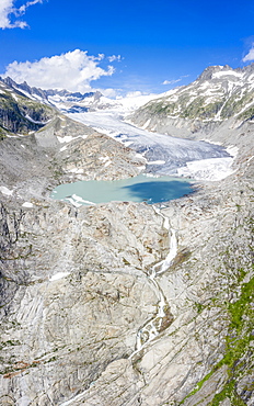 Aerial panoramic of Rhone Glacier and glacial lake at its base, Gletsch, Canton of Valais, Switzerland, Europe